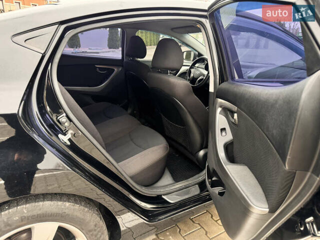 Черный Хендай Элантра, объемом двигателя 1.8 л и пробегом 130 тыс. км за 7300 $, фото 11 на Automoto.ua