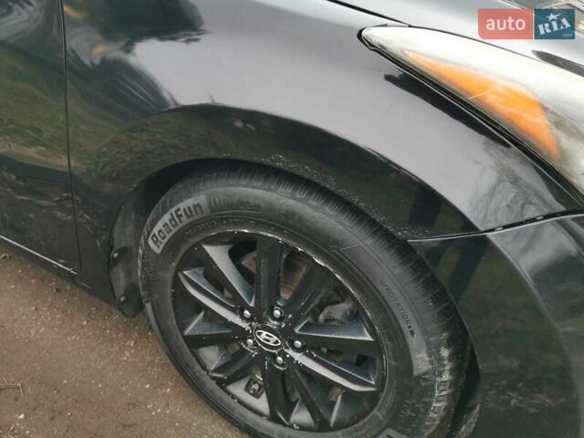 Черный Хендай Элантра, объемом двигателя 1.8 л и пробегом 244 тыс. км за 6950 $, фото 7 на Automoto.ua