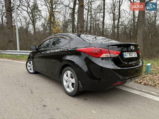 Черный Хендай Элантра, объемом двигателя 1.8 л и пробегом 140 тыс. км за 10900 $, фото 1 на Automoto.ua