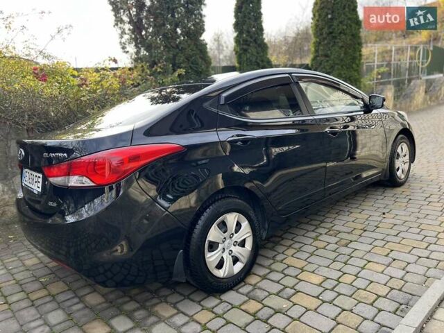 Черный Хендай Элантра, объемом двигателя 1.59 л и пробегом 203 тыс. км за 7300 $, фото 10 на Automoto.ua