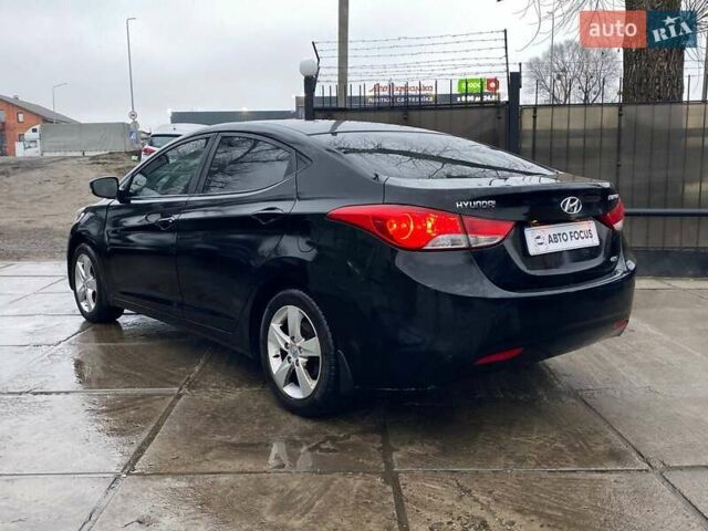 Черный Хендай Элантра, объемом двигателя 1.8 л и пробегом 221 тыс. км за 8990 $, фото 4 на Automoto.ua