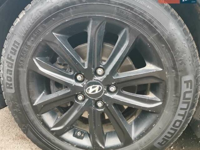 Черный Хендай Элантра, объемом двигателя 1.8 л и пробегом 244 тыс. км за 6950 $, фото 12 на Automoto.ua