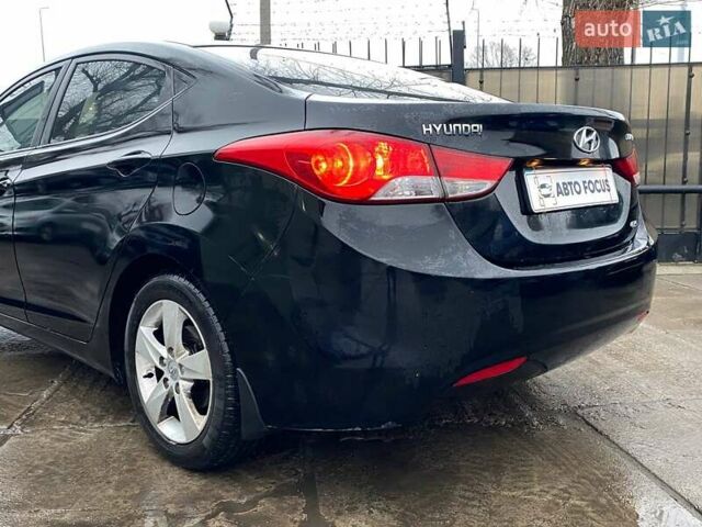 Черный Хендай Элантра, объемом двигателя 1.8 л и пробегом 221 тыс. км за 8990 $, фото 7 на Automoto.ua
