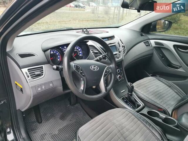 Черный Хендай Элантра, объемом двигателя 1.8 л и пробегом 244 тыс. км за 6950 $, фото 6 на Automoto.ua