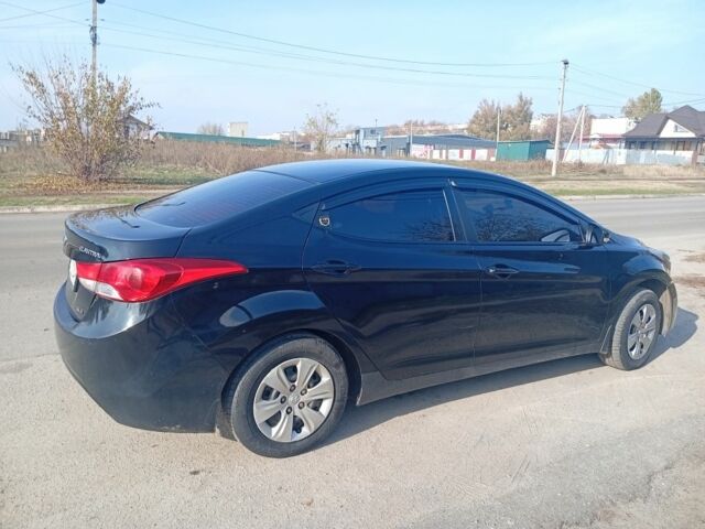 Черный Хендай Элантра, объемом двигателя 1.6 л и пробегом 332 тыс. км за 9000 $, фото 2 на Automoto.ua