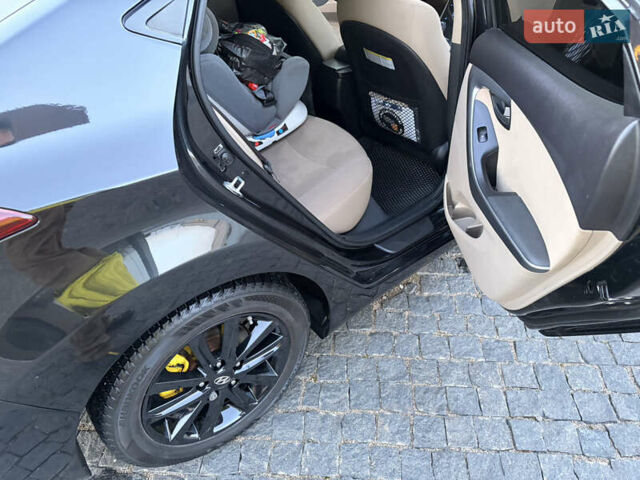 Чорний Хендай Елантра, об'ємом двигуна 1.8 л та пробігом 84 тис. км за 11000 $, фото 17 на Automoto.ua