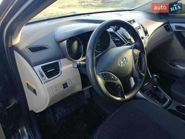 Черный Хендай Элантра, объемом двигателя 1.8 л и пробегом 209 тыс. км за 8300 $, фото 4 на Automoto.ua