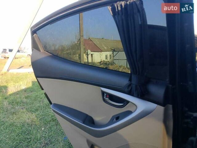 Черный Хендай Элантра, объемом двигателя 1.8 л и пробегом 209 тыс. км за 8300 $, фото 12 на Automoto.ua