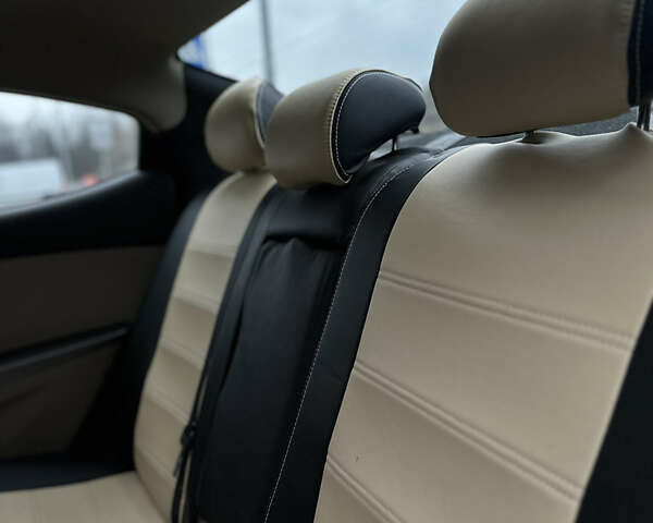 Черный Хендай Элантра, объемом двигателя 1.8 л и пробегом 200 тыс. км за 9500 $, фото 50 на Automoto.ua