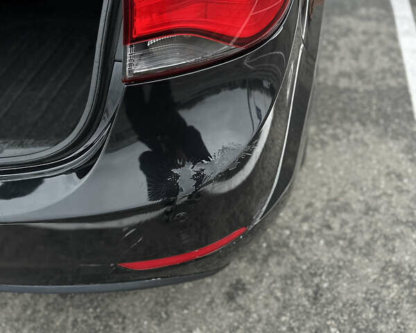 Черный Хендай Элантра, объемом двигателя 1.8 л и пробегом 200 тыс. км за 9500 $, фото 42 на Automoto.ua