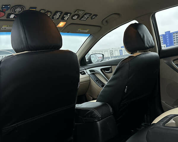 Черный Хендай Элантра, объемом двигателя 1.8 л и пробегом 200 тыс. км за 9500 $, фото 52 на Automoto.ua