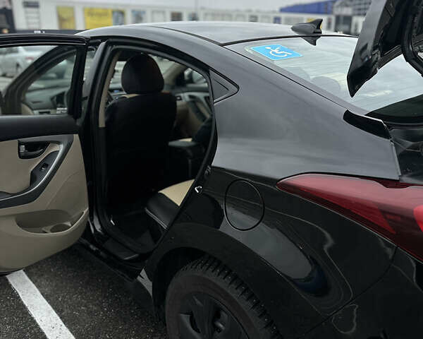 Черный Хендай Элантра, объемом двигателя 1.8 л и пробегом 200 тыс. км за 9500 $, фото 56 на Automoto.ua