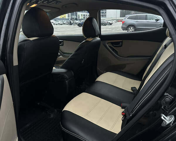 Черный Хендай Элантра, объемом двигателя 1.8 л и пробегом 200 тыс. км за 9500 $, фото 49 на Automoto.ua