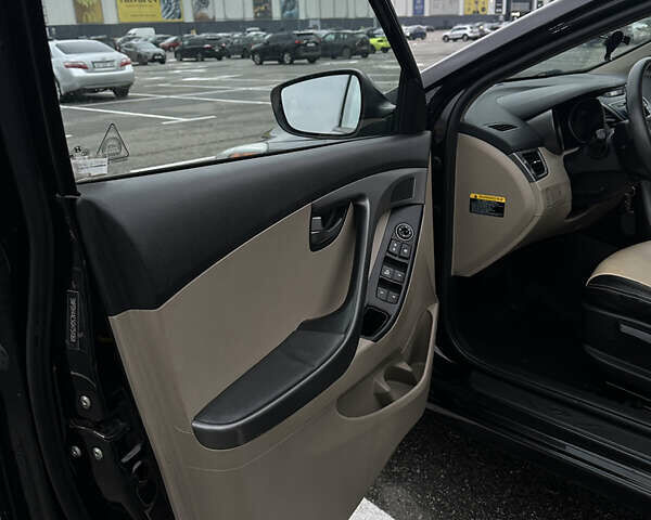 Черный Хендай Элантра, объемом двигателя 1.8 л и пробегом 200 тыс. км за 9500 $, фото 60 на Automoto.ua