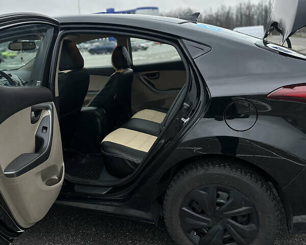 Черный Хендай Элантра, объемом двигателя 1.8 л и пробегом 200 тыс. км за 9500 $, фото 55 на Automoto.ua