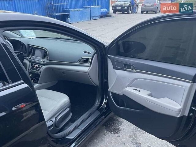 Черный Хендай Элантра, объемом двигателя 2 л и пробегом 232 тыс. км за 9200 $, фото 5 на Automoto.ua