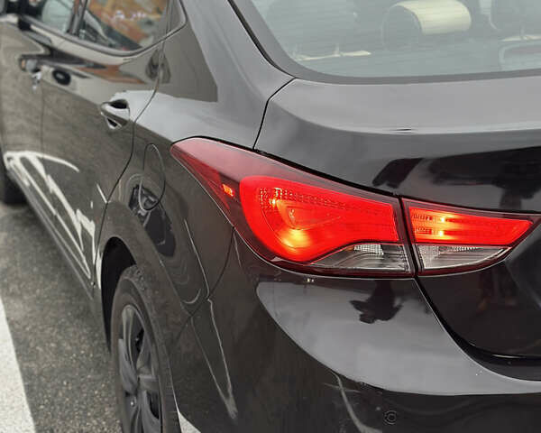 Черный Хендай Элантра, объемом двигателя 1.8 л и пробегом 200 тыс. км за 9500 $, фото 21 на Automoto.ua