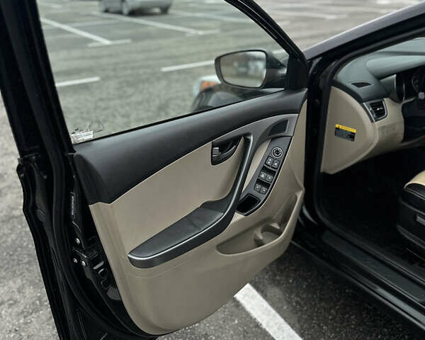 Черный Хендай Элантра, объемом двигателя 1.8 л и пробегом 200 тыс. км за 9500 $, фото 62 на Automoto.ua