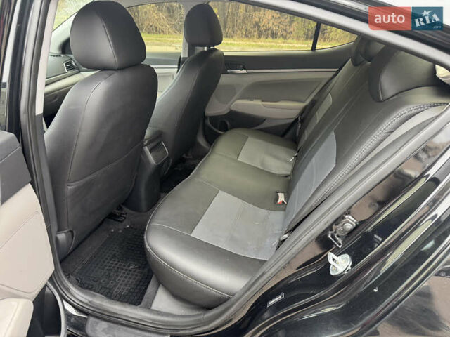 Черный Хендай Элантра, объемом двигателя 1.8 л и пробегом 90 тыс. км за 12000 $, фото 13 на Automoto.ua