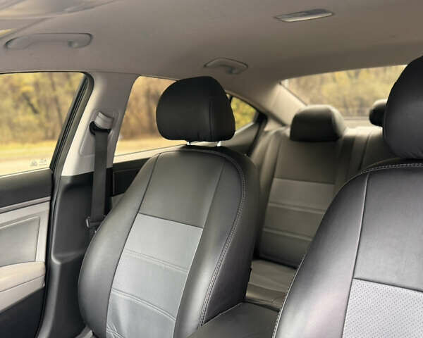 Черный Хендай Элантра, объемом двигателя 1.8 л и пробегом 90 тыс. км за 12000 $, фото 10 на Automoto.ua