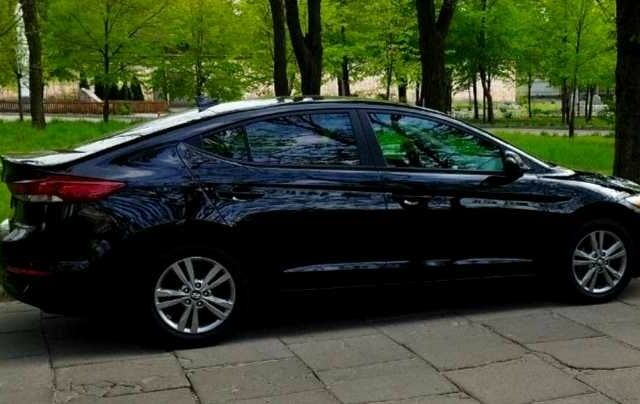 Черный Хендай Элантра, объемом двигателя 2 л и пробегом 110 тыс. км за 10700 $, фото 3 на Automoto.ua