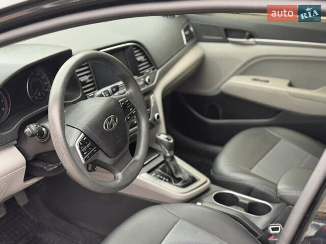 Черный Хендай Элантра, объемом двигателя 1.8 л и пробегом 90 тыс. км за 12000 $, фото 7 на Automoto.ua