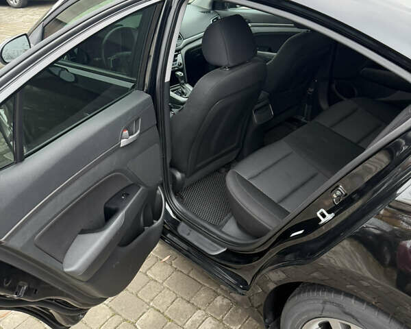 Черный Хендай Элантра, объемом двигателя 2 л и пробегом 182 тыс. км за 12700 $, фото 14 на Automoto.ua