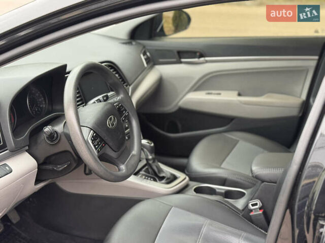 Черный Хендай Элантра, объемом двигателя 1.8 л и пробегом 90 тыс. км за 12000 $, фото 8 на Automoto.ua