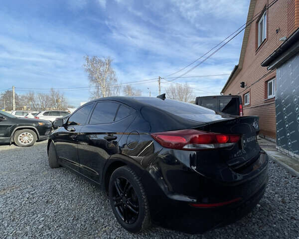 Чорний Хендай Елантра, об'ємом двигуна 2 л та пробігом 233 тис. км за 11800 $, фото 3 на Automoto.ua