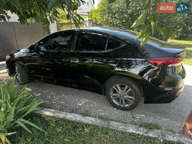 Чорний Хендай Елантра, об'ємом двигуна 2 л та пробігом 150 тис. км за 11200 $, фото 3 на Automoto.ua