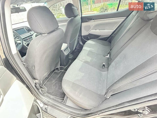 Чорний Хендай Елантра, об'ємом двигуна 2 л та пробігом 150 тис. км за 11200 $, фото 8 на Automoto.ua