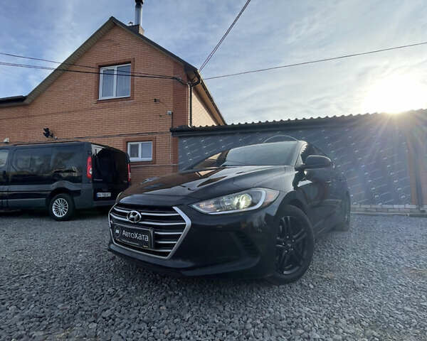 Чорний Хендай Елантра, об'ємом двигуна 2 л та пробігом 233 тис. км за 11800 $, фото 1 на Automoto.ua