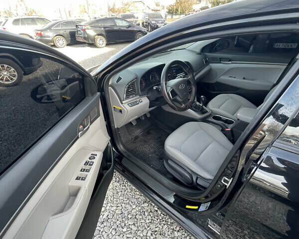 Чорний Хендай Елантра, об'ємом двигуна 2 л та пробігом 233 тис. км за 11800 $, фото 10 на Automoto.ua