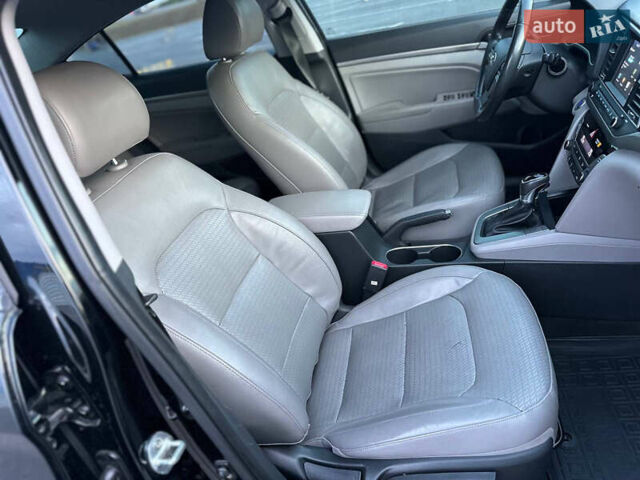 Черный Хендай Элантра, объемом двигателя 2 л и пробегом 130 тыс. км за 12000 $, фото 17 на Automoto.ua