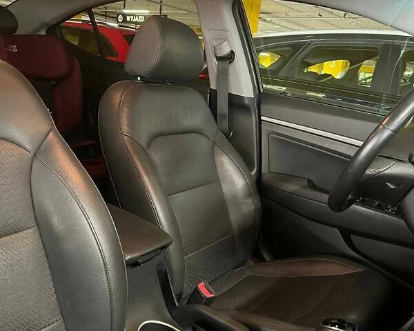 Черный Хендай Элантра, объемом двигателя 2 л и пробегом 99 тыс. км за 13000 $, фото 12 на Automoto.ua