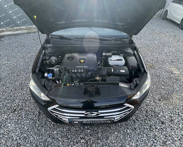 Чорний Хендай Елантра, об'ємом двигуна 2 л та пробігом 233 тис. км за 11800 $, фото 7 на Automoto.ua