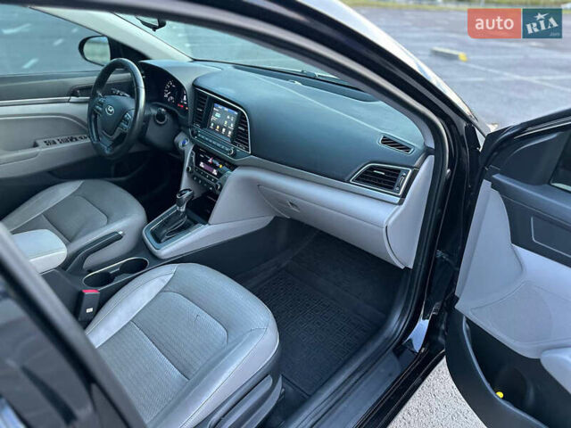 Черный Хендай Элантра, объемом двигателя 2 л и пробегом 130 тыс. км за 12000 $, фото 18 на Automoto.ua