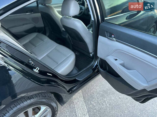 Черный Хендай Элантра, объемом двигателя 2 л и пробегом 130 тыс. км за 12000 $, фото 20 на Automoto.ua