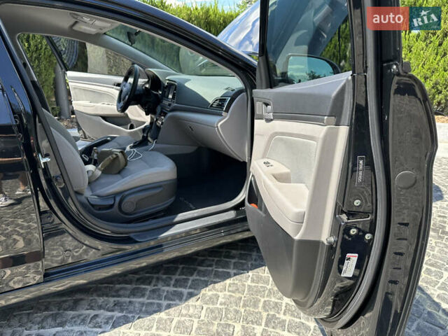 Черный Хендай Элантра, объемом двигателя 2 л и пробегом 160 тыс. км за 13500 $, фото 9 на Automoto.ua