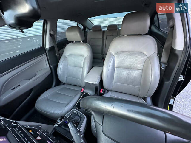 Черный Хендай Элантра, объемом двигателя 2 л и пробегом 130 тыс. км за 12000 $, фото 21 на Automoto.ua