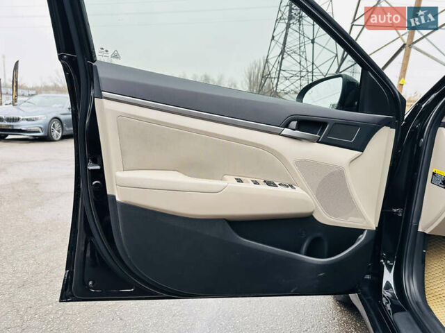 Чорний Хендай Елантра, об'ємом двигуна 2 л та пробігом 129 тис. км за 10400 $, фото 14 на Automoto.ua