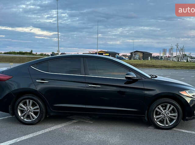 Черный Хендай Элантра, объемом двигателя 2 л и пробегом 130 тыс. км за 12000 $, фото 7 на Automoto.ua