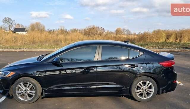 Черный Хендай Элантра, объемом двигателя 2 л и пробегом 75 тыс. км за 12500 $, фото 1 на Automoto.ua