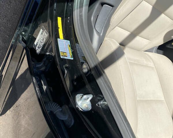 Черный Хендай Элантра, объемом двигателя 2 л и пробегом 56 тыс. км за 14000 $, фото 22 на Automoto.ua