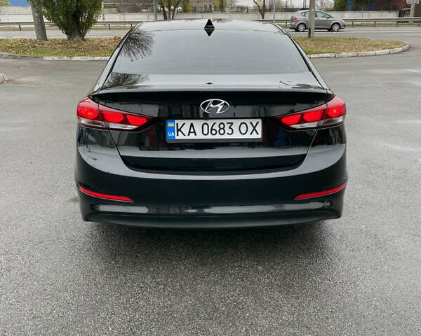 Чорний Хендай Елантра, об'ємом двигуна 2 л та пробігом 159 тис. км за 9600 $, фото 3 на Automoto.ua