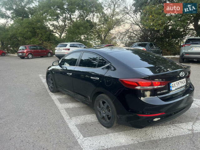 Черный Хендай Элантра, объемом двигателя 1.59 л и пробегом 210 тыс. км за 9300 $, фото 4 на Automoto.ua