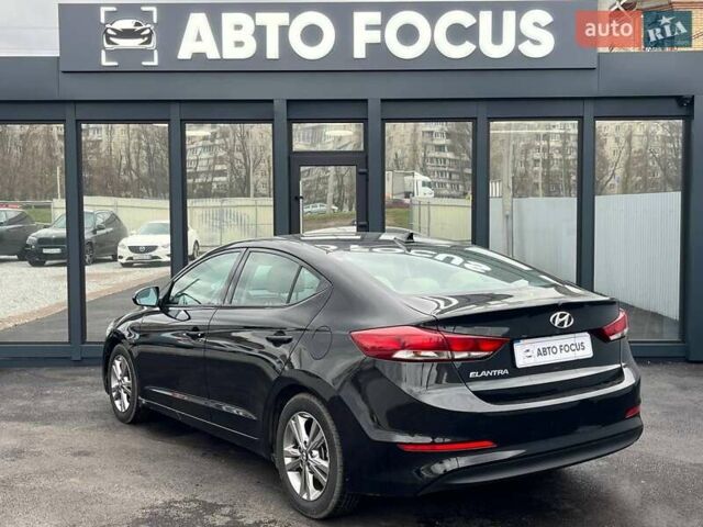 Чорний Хендай Елантра, об'ємом двигуна 2 л та пробігом 98 тис. км за 13990 $, фото 4 на Automoto.ua