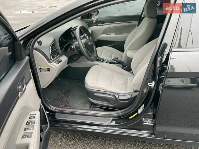 Чорний Хендай Елантра, об'ємом двигуна 2 л та пробігом 159 тис. км за 9600 $, фото 6 на Automoto.ua