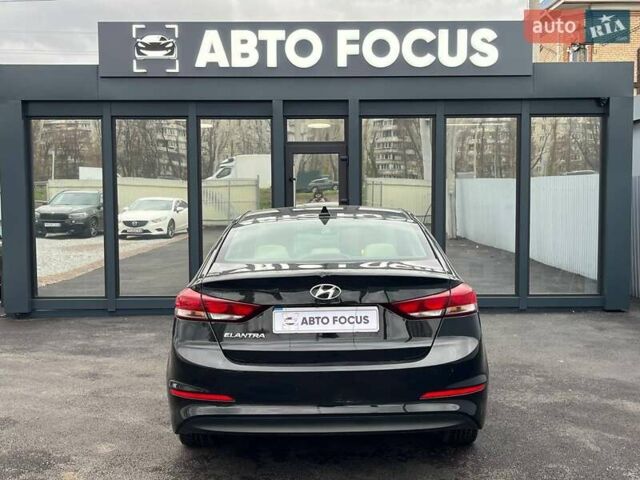 Чорний Хендай Елантра, об'ємом двигуна 2 л та пробігом 98 тис. км за 13990 $, фото 5 на Automoto.ua