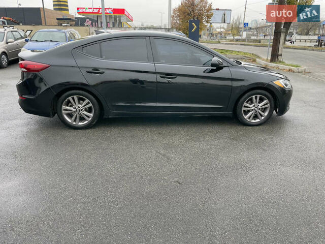 Чорний Хендай Елантра, об'ємом двигуна 2 л та пробігом 159 тис. км за 9600 $, фото 2 на Automoto.ua